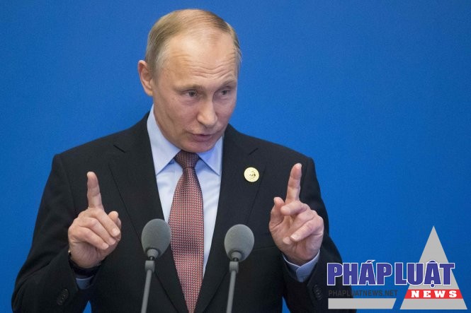 Tổng thống Nga Vladimir Putin phát biểu trước báo chí bên lề diễn đàn quốc tế cấp cao "Vành đai và con đường" tại Bắc Kinh, Trung Quốc ngày 15-5 - Ảnh: Reuters