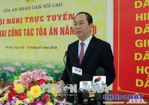 Chủ tịch nước Trần Đại Quang, Trưởng Ban Chỉ đạo cải cách Tư pháp Trung ương đến dự và phát biểu chỉ đạo Hội nghị tổng kết năm 2017 và triển khai công tác năm 2018 của ngành Tòa án. Ảnh: Nhan Sáng-TTXVN